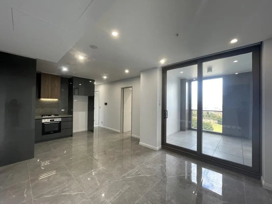 Kitchen balcony and living area interior at Belong Parramatta in Sydney Student Accommodation