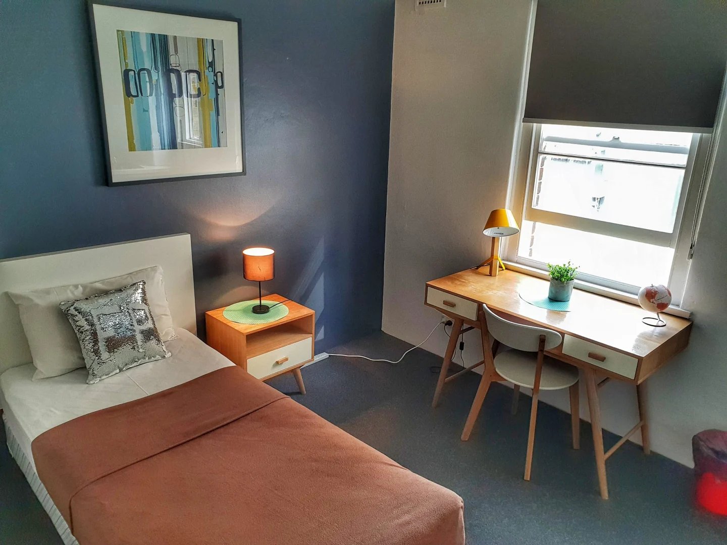 Bed desk lamps pillow framed art bedroom at ume Hyde Park in Sydney Student Accommodation