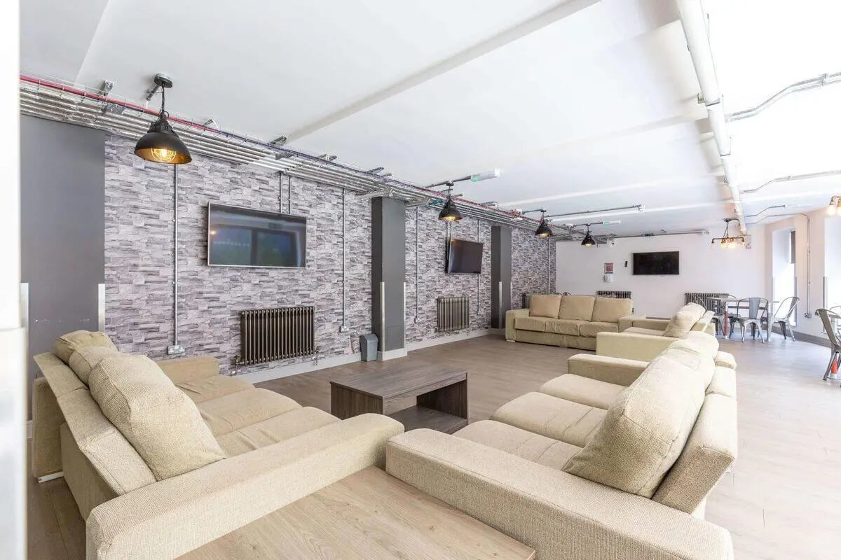 Sofas televisions and coffee tables communal area at The Foundry in Leeds Student Accommodation