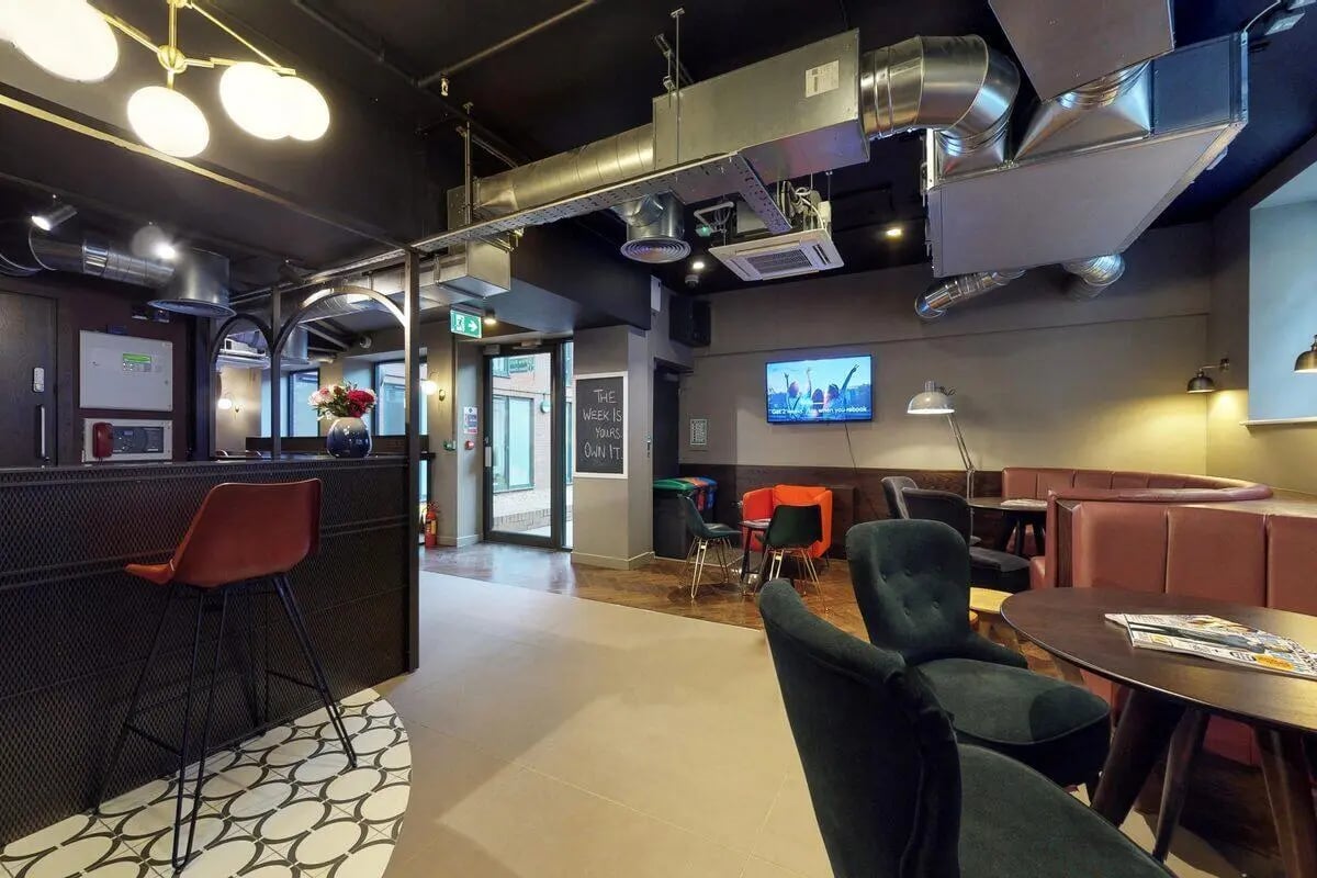 Bar counter seating and TV common area at Haymarket Edinburgh in Edinburgh Student Accommodation