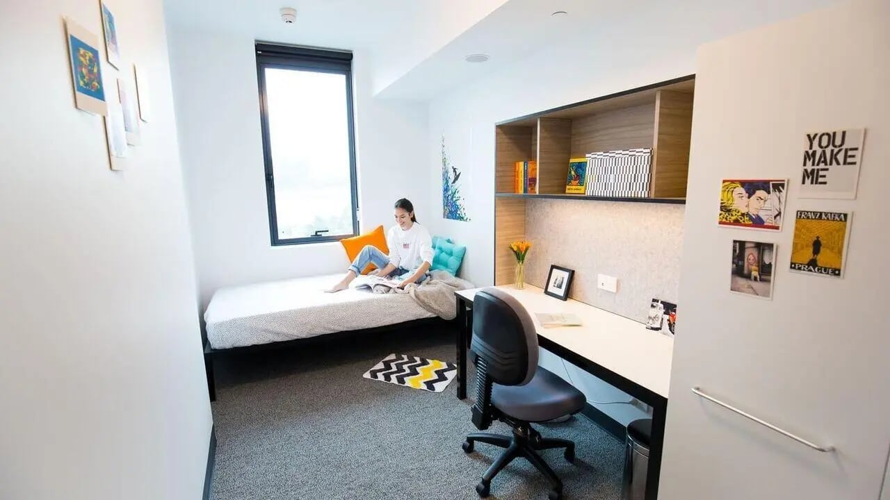 Bed desk chair shelves student reading bedroom at UniLodge Park Central in Brisbane Student Accommodation