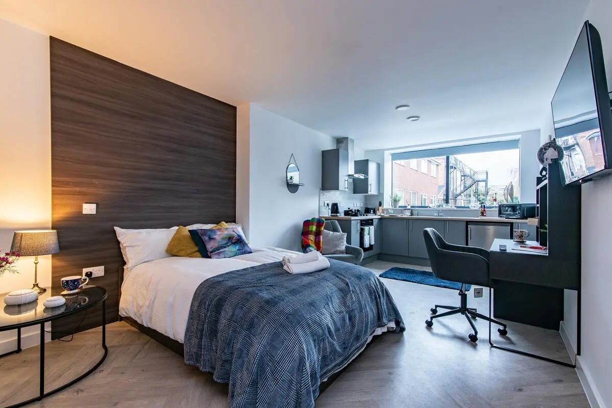 Bed kitchen desk and chair studio apartment at Broadgate House Student Living in Nottingham Student Accommodation