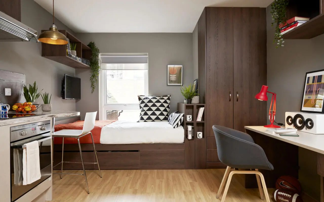 Bed desk kitchen and wardrobe studio apartment at Student Castle Lincoln in Lincoln Student Accommodation