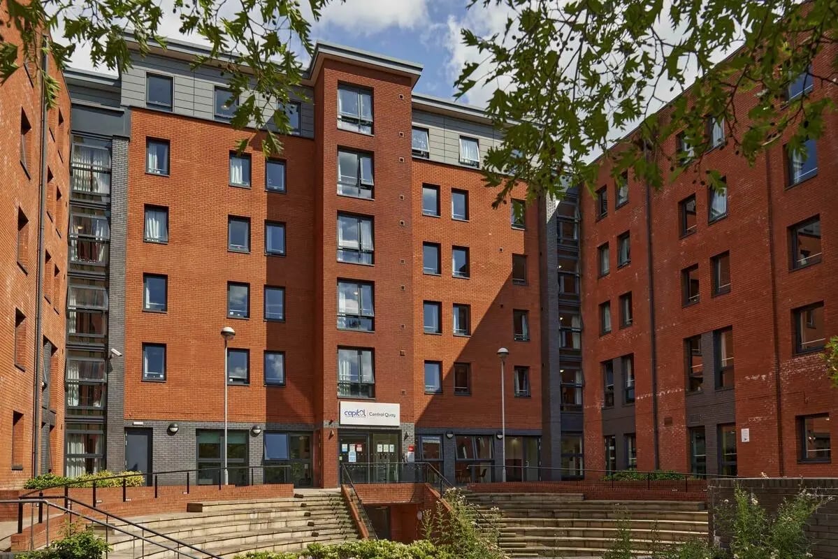 Brick building with many windows exterior at Central Quay in Sheffield Student Accommodation