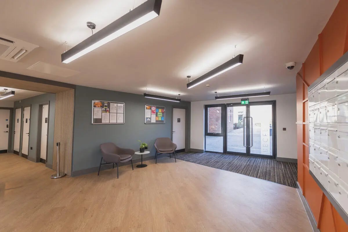 Seating noticeboards and mailboxes communal area at The Park in Oxford Student Accommodation