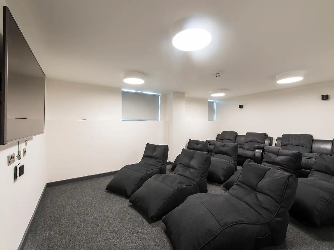 Beanbag chairs and recliners in cinema room at New Mill in Dublin Student Accommodation