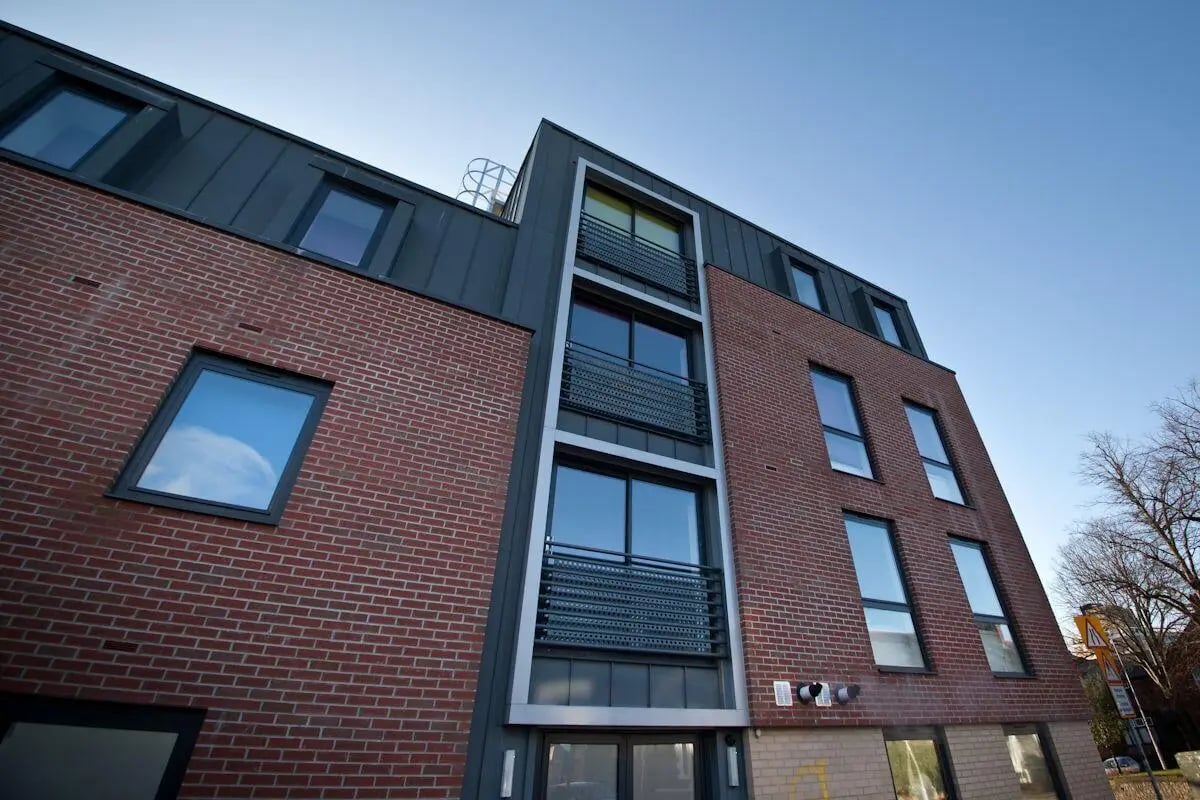 Brick building with windows and balconies exterior at Alwyn Court in Cardiff Student Accommodation