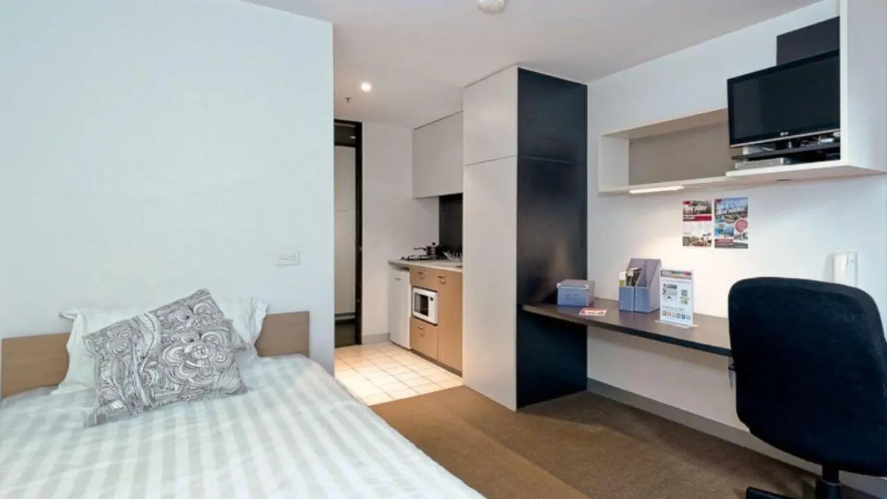 Bed desk kitchen and TV bedroom at Student Living on Riversdale in Melbourne Student Accommodation