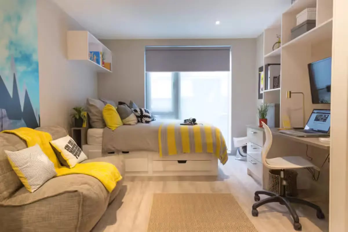Bed sofa desk and shelves student bedroom at Willowbank in Glasgow Student Accommodation