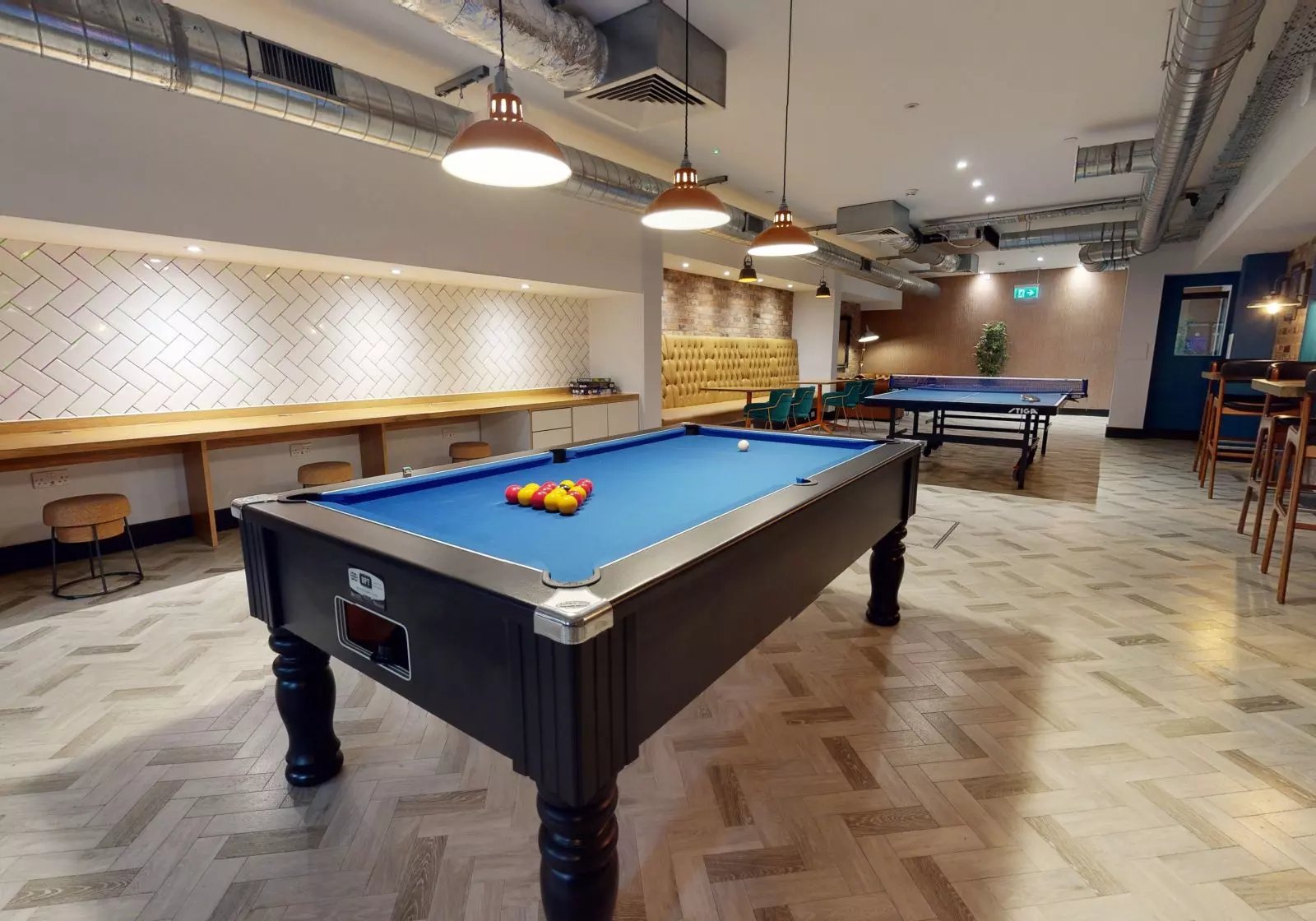 Pool table ping pong table bar area playing area at iQ Penworks House in Birmingham Student Accommodation