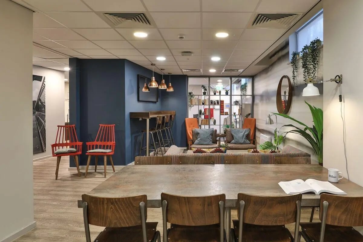 Table chairs bar stools lounge seating common area at Trippet Lane in Sheffield Student Accommodation