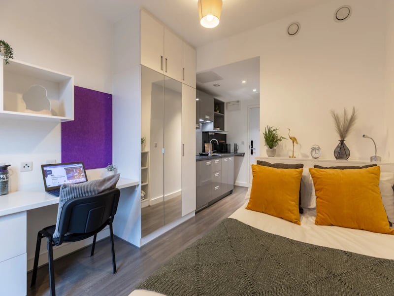 Desk laptop purple board bed kitchen bedroom at 88 Bromsgrove House in Birmingham Student Accommodation