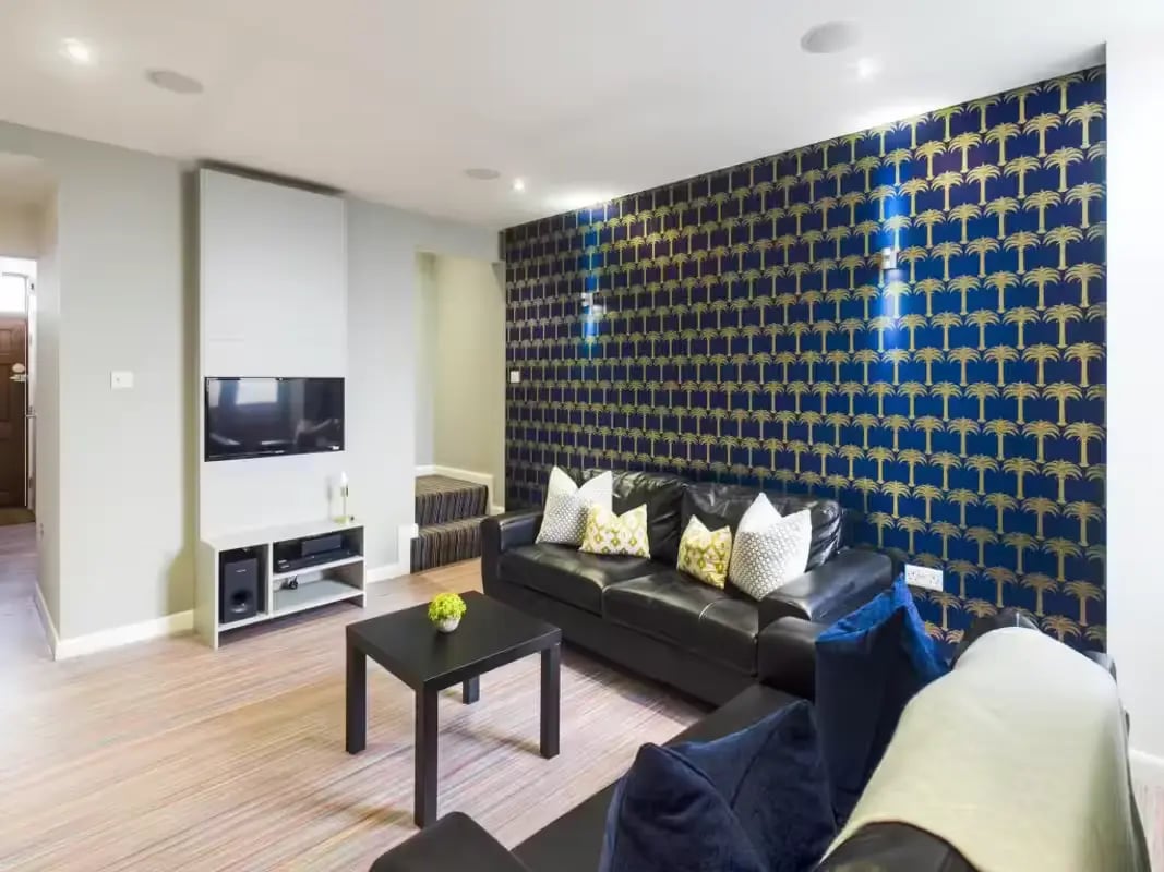 Leather sofas black coffee table living room at 19 Carlton Road in Stoke-On-Trent Student Accommodation