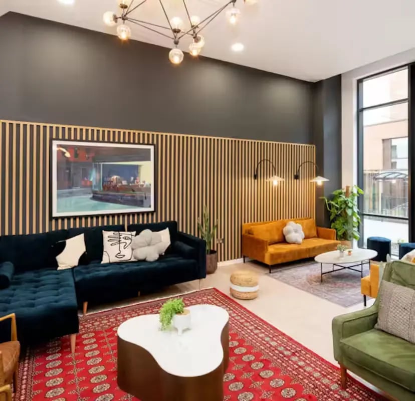 Sofas artwork plant modern living room at Zinc Quarter in Bristol Student Accommodation