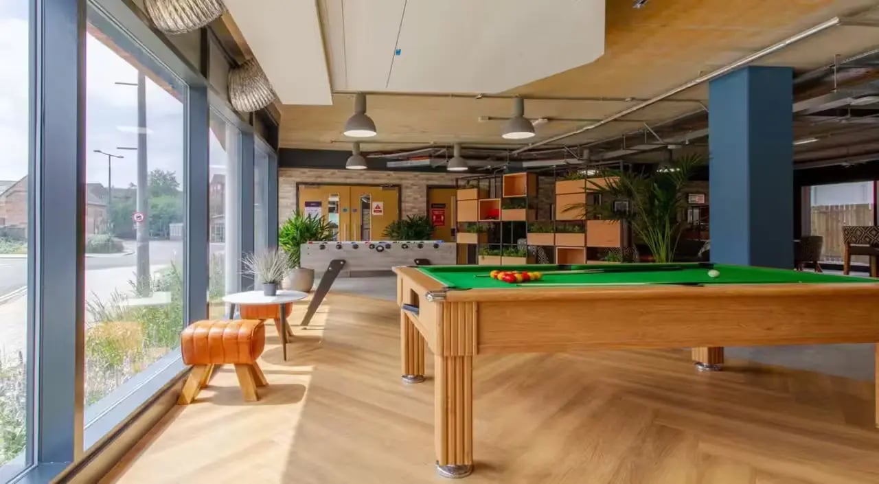 Pool table foosball plant shelves communal area at The Croft in Derby Student Accommodation