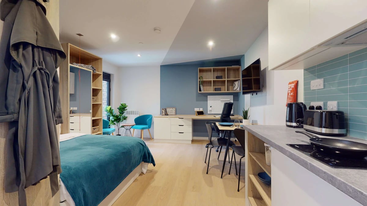 Bed wardrobe study desk dining area kitchen living room exterior at Mayfield Residences in Edinburgh Student Accommodation