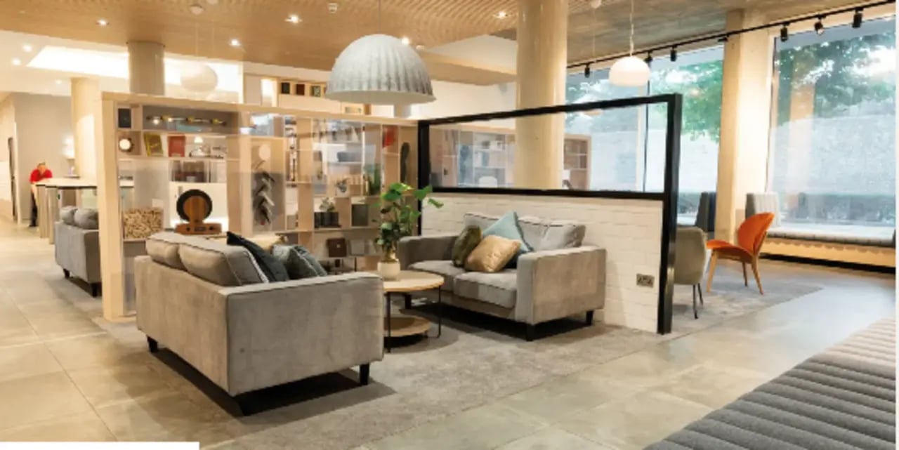 Lounge area with sofas and tables living room at Palamon Court in Canterbury Student Accommodation