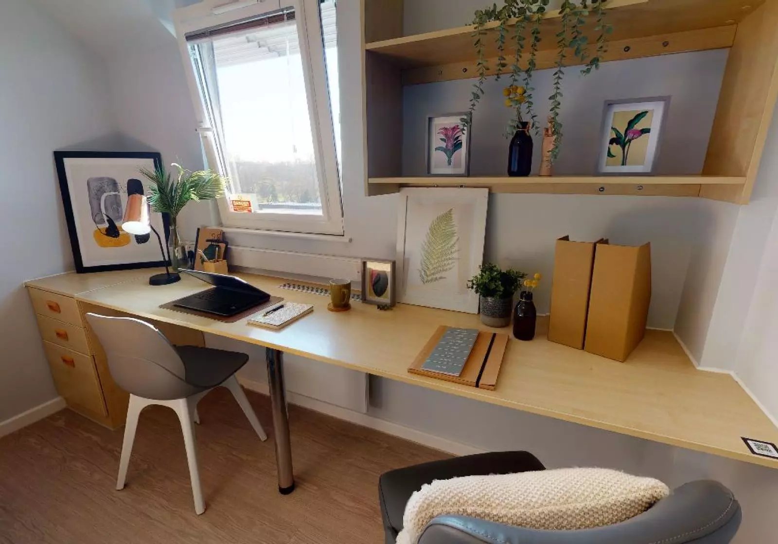 Desk with chair and artwork study area at Opal Court Leicester in Leicester Student Accommodation