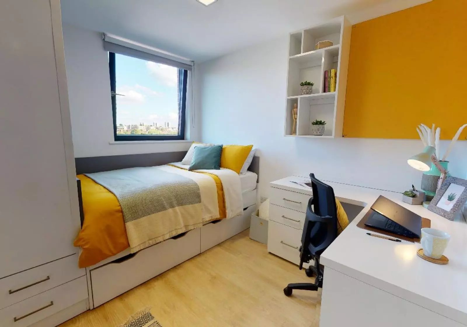 Bed desk shelves window closet Bedroom at iQ Haywood House in London Student Accommodation