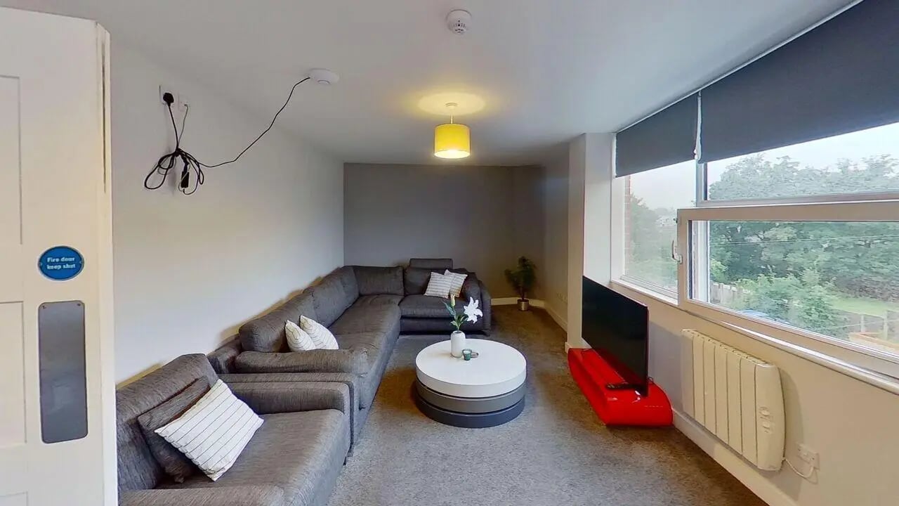 Gray sectional sofa white coffee table living room at Middle Street - Nottingham in Nottingham Student Accommodation