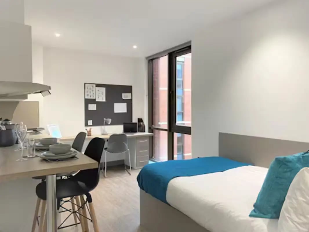 Bed desk and kitchen counter studio apartment at Great Patrick Street in Belfast Student Accommodation