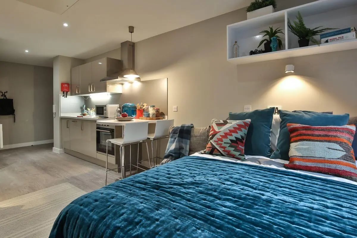 Bed kitchen and breakfast bar studio apartment at King's Stables Road in Edinburgh Student Accommodation