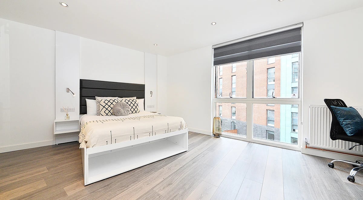 Bed desk chair large window bedroom at Miura in Nottingham Student Accommodation