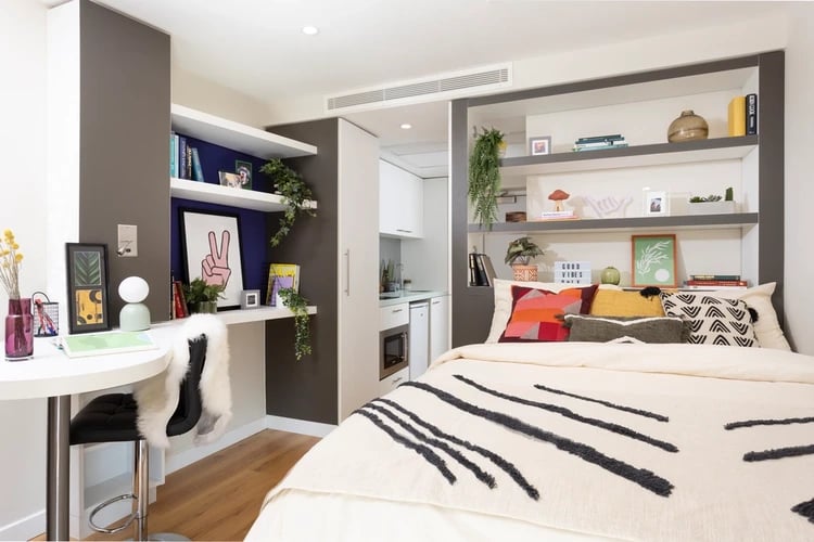 Bed desk and kitchenette student studio at Bridgewater Heights in Manchester Student Accommodation
