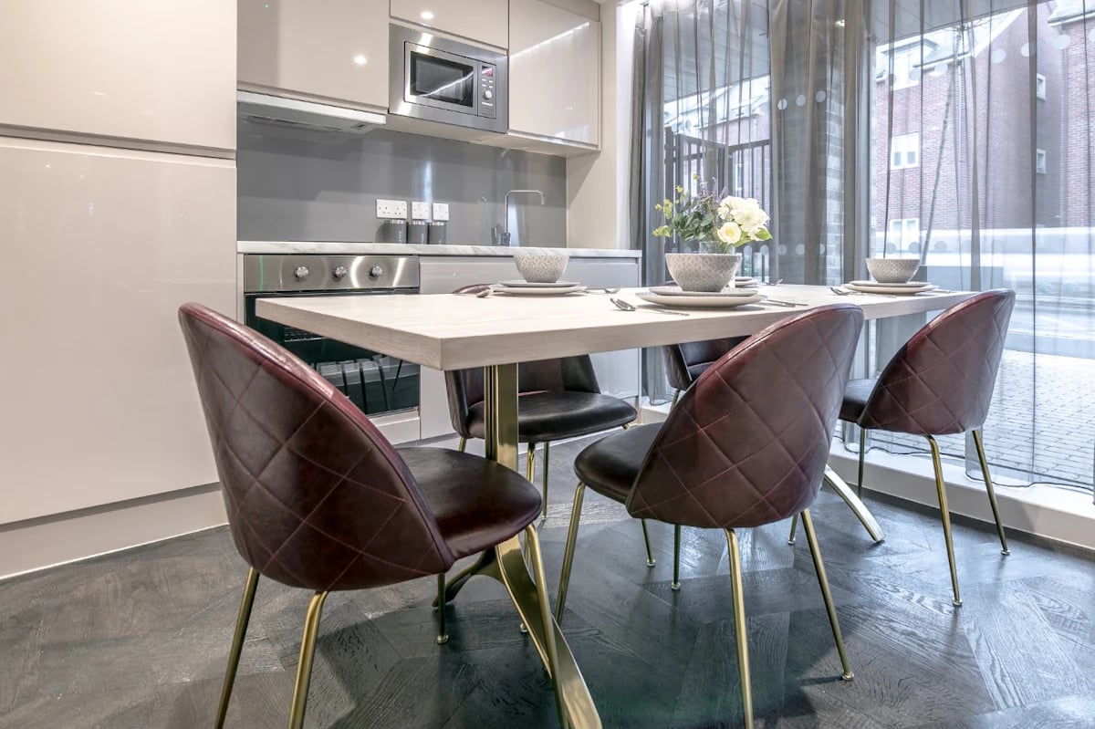 Modern kitchen table with chairs dining area at 79 Silver Street in Reading Student Accommodation