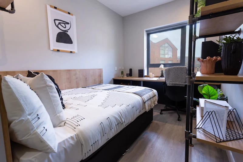 Bed desk and shelves bedroom at Electric Press in Sheffield Student Accommodation