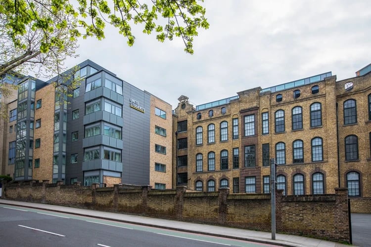 Modern brick building with Unite Students sign exterior at Elizabeth Croll House in London Student Accommodation