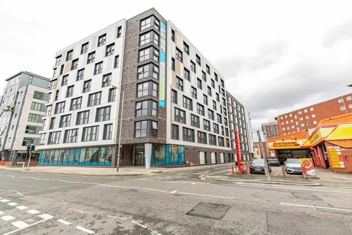 Modern apartment building with large windows exterior at Glassworks - Liverpool in Liverpool Student Accommodation