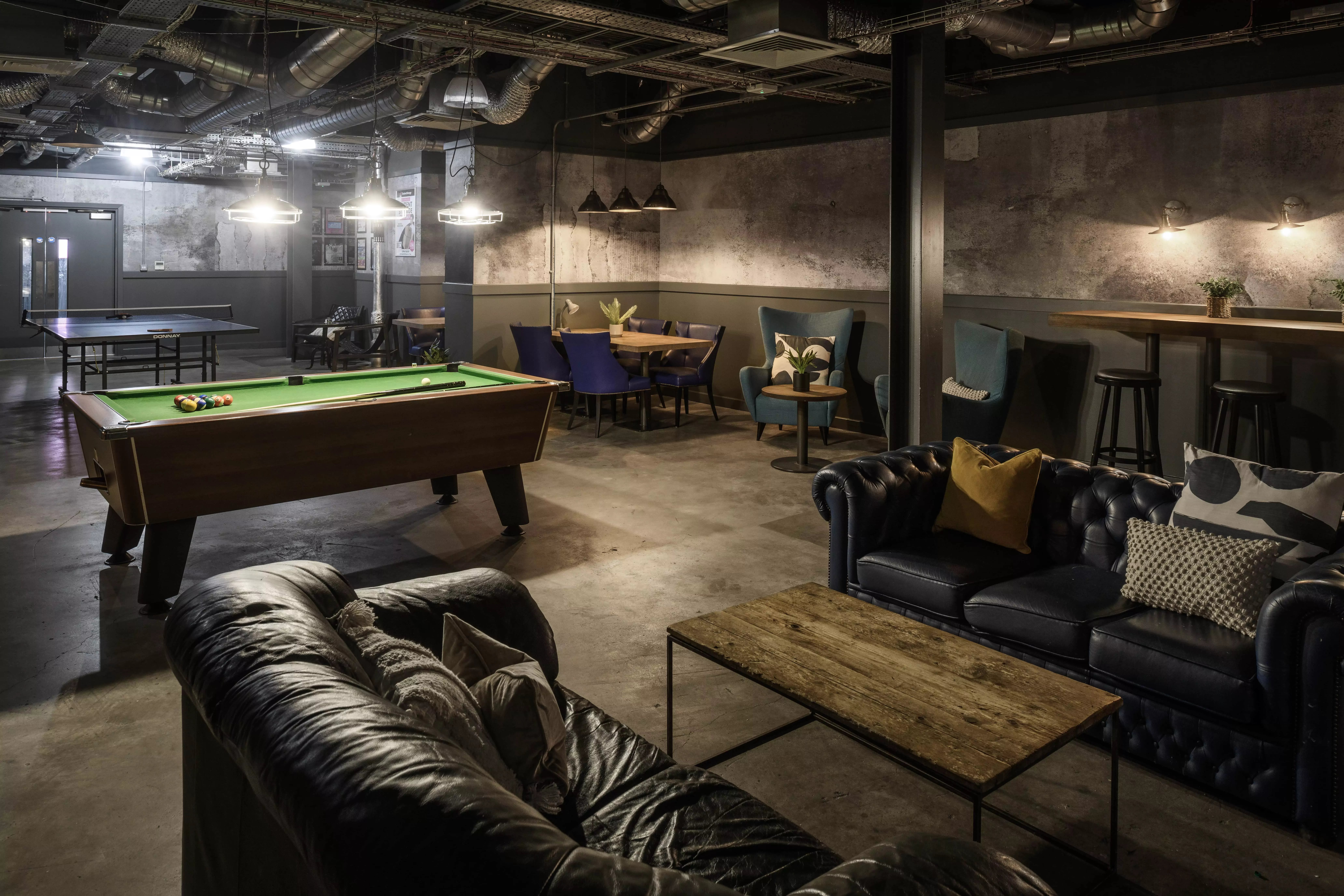 Billiard table ping pong table sofas and chairs lounge at Hope Street in Liverpool Student Accommodation