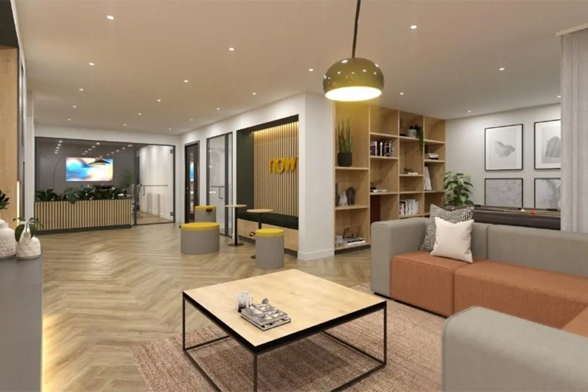 Modern lounge with sofas bookshelves and pool table common area at Jennens Court in Birmingham Student Accommodation