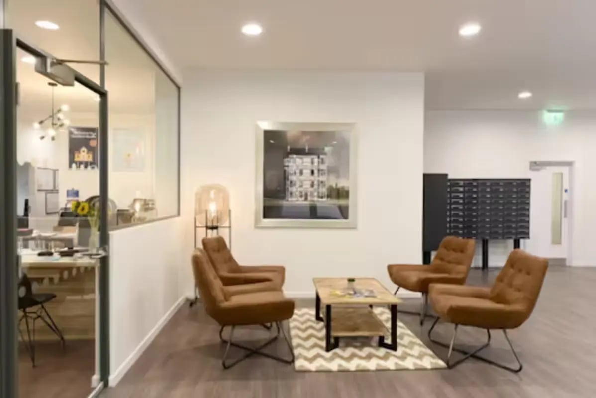 Comfortable seating and a coffee table communal area at St Mungo's in Glasgow Student Accommodation