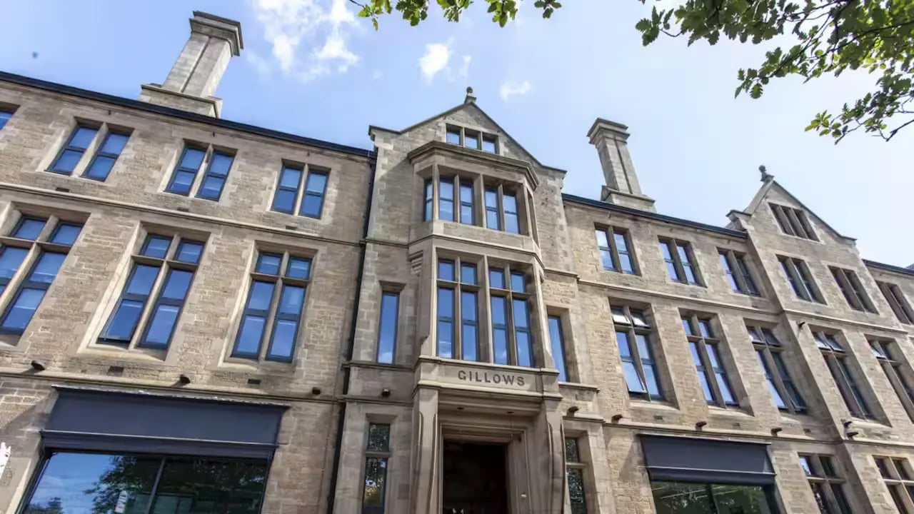 Stone building with many windows exterior at Gillows in Lancaster Student Accommodation