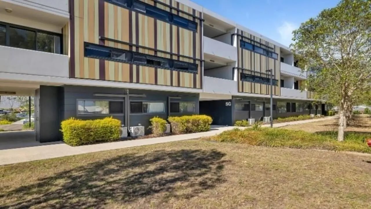 Modern student housing building with striped facade exterior at Western Sydney University Penrith Village in Sydney Student Accommodation
