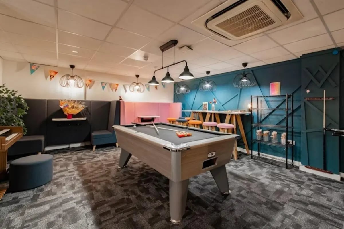 Pool table with seating and bar area communal area at Studio 58 in Bristol Student Accommodation