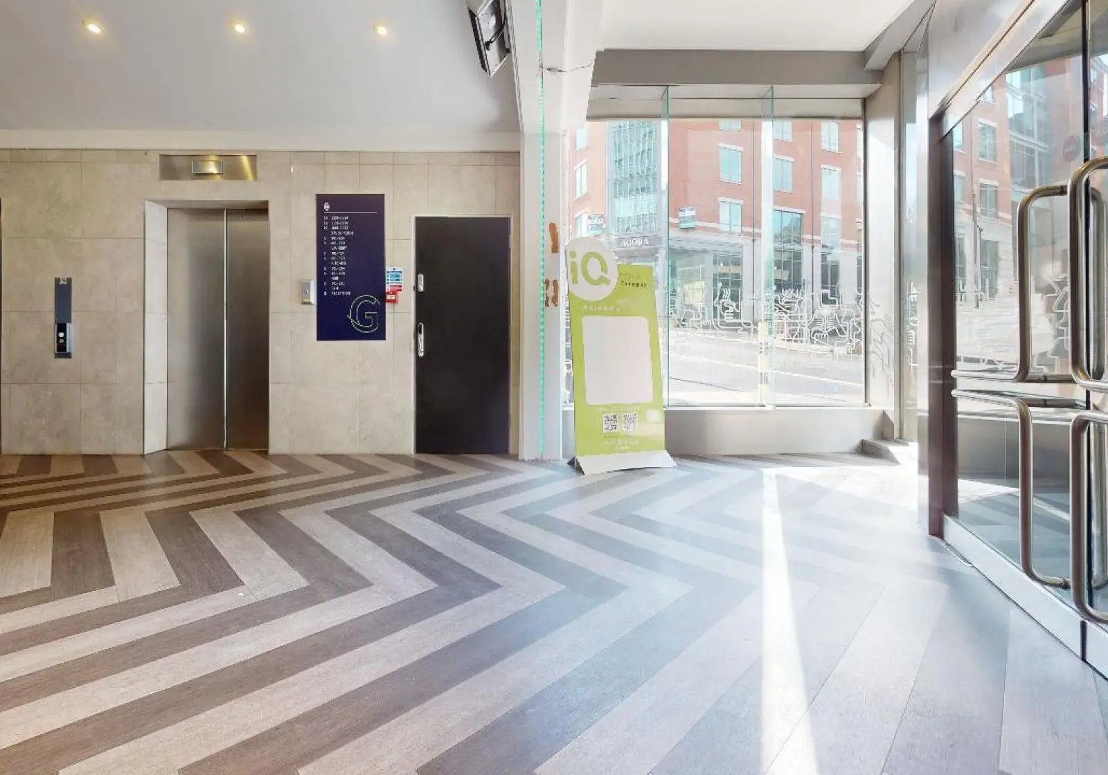 Elevator door and lobby sign entrance area at iQ Newland House in Nottingham Student Accommodation