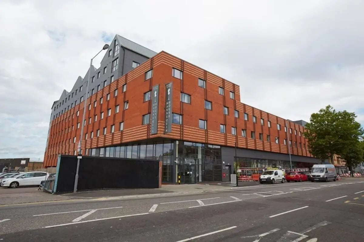 Modern brick student accommodation building exterior. at Mannequin House in London Student Accommodation