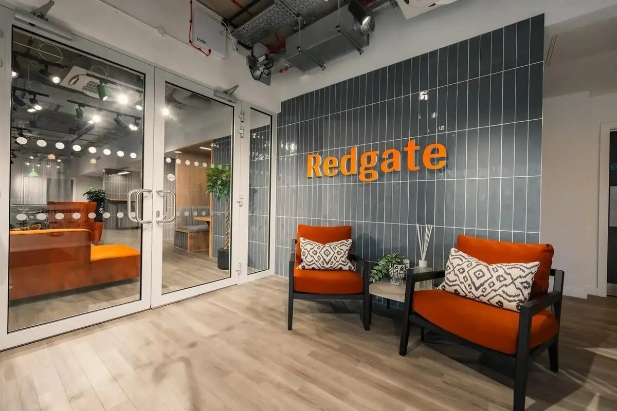 Orange chairs Redgate logo entrance area at Redgate in Nottingham Student Accommodation