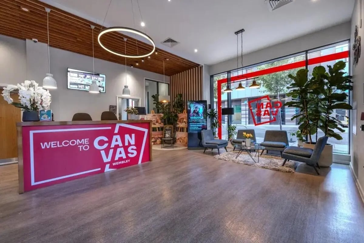 Reception desk lounge area with modern chairs Image Type at Wembley Barnard Point in London Student Accommodation
