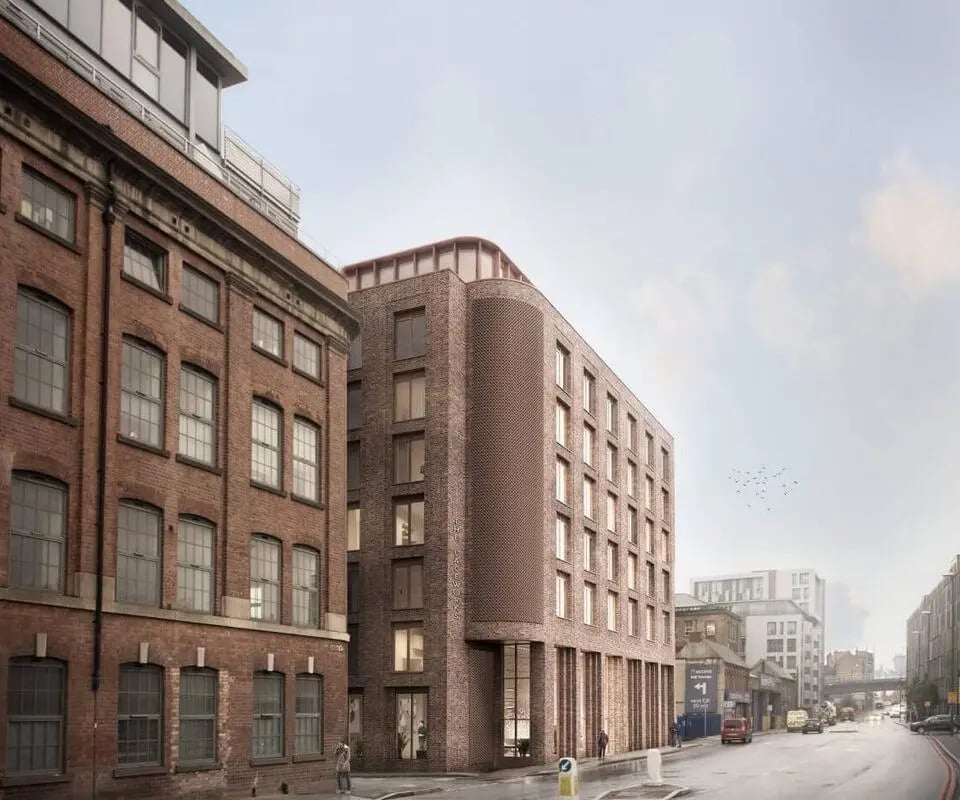 Brick student accommodation building on a street exterior at The Laceworks Nottingham in Nottingham Student Accommodation