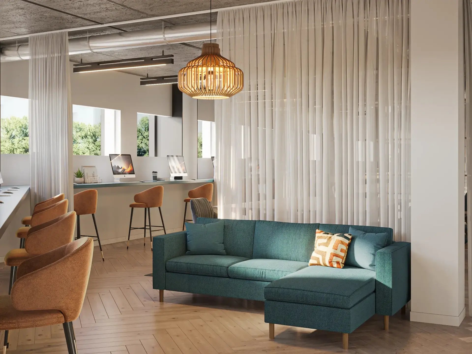 Teal sectional sofa with patterned pillow living room at Telephone House in Dundee Student Accommodation