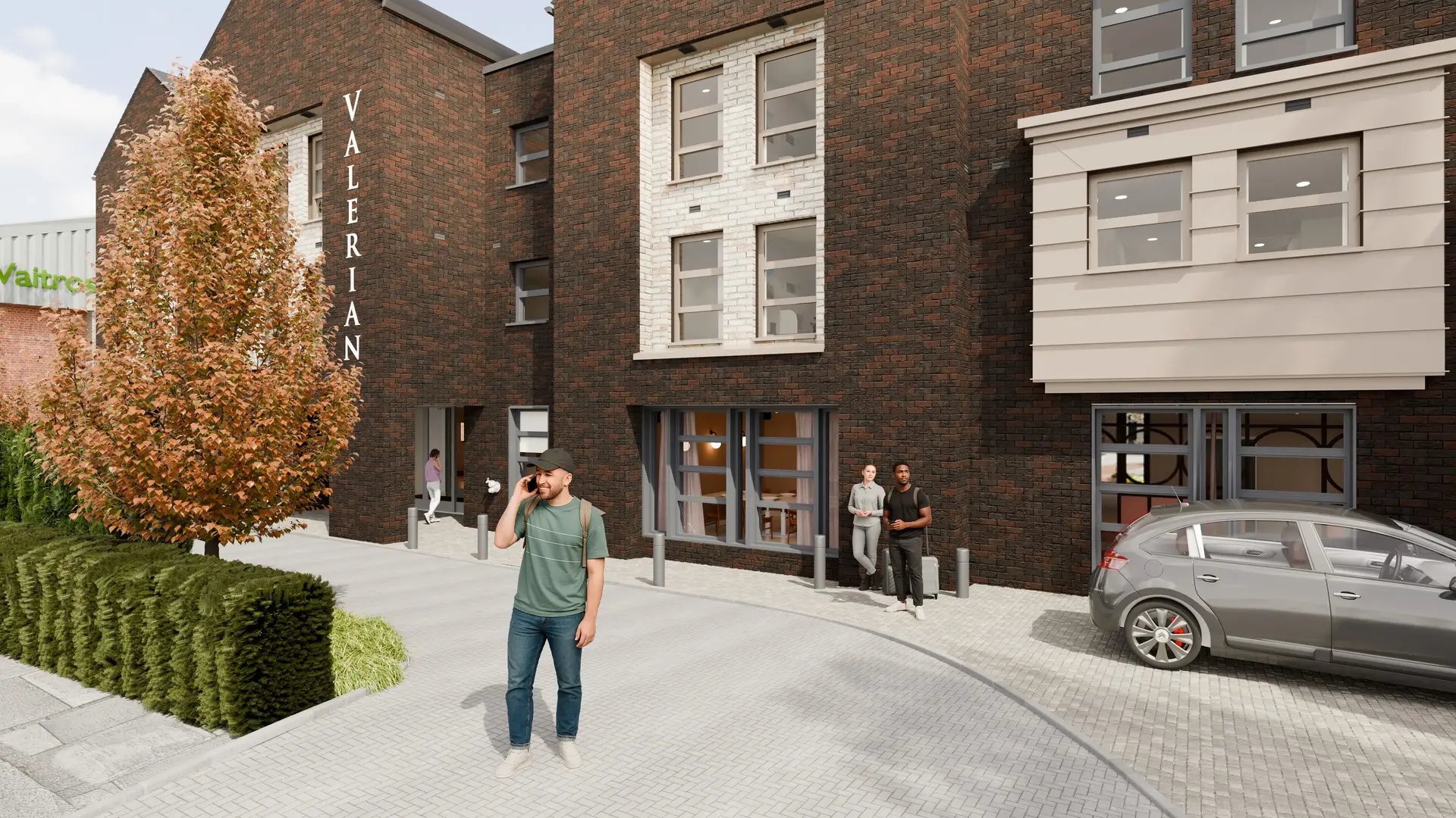 Brick building with students and car exterior at Valerian in York Student Accommodation