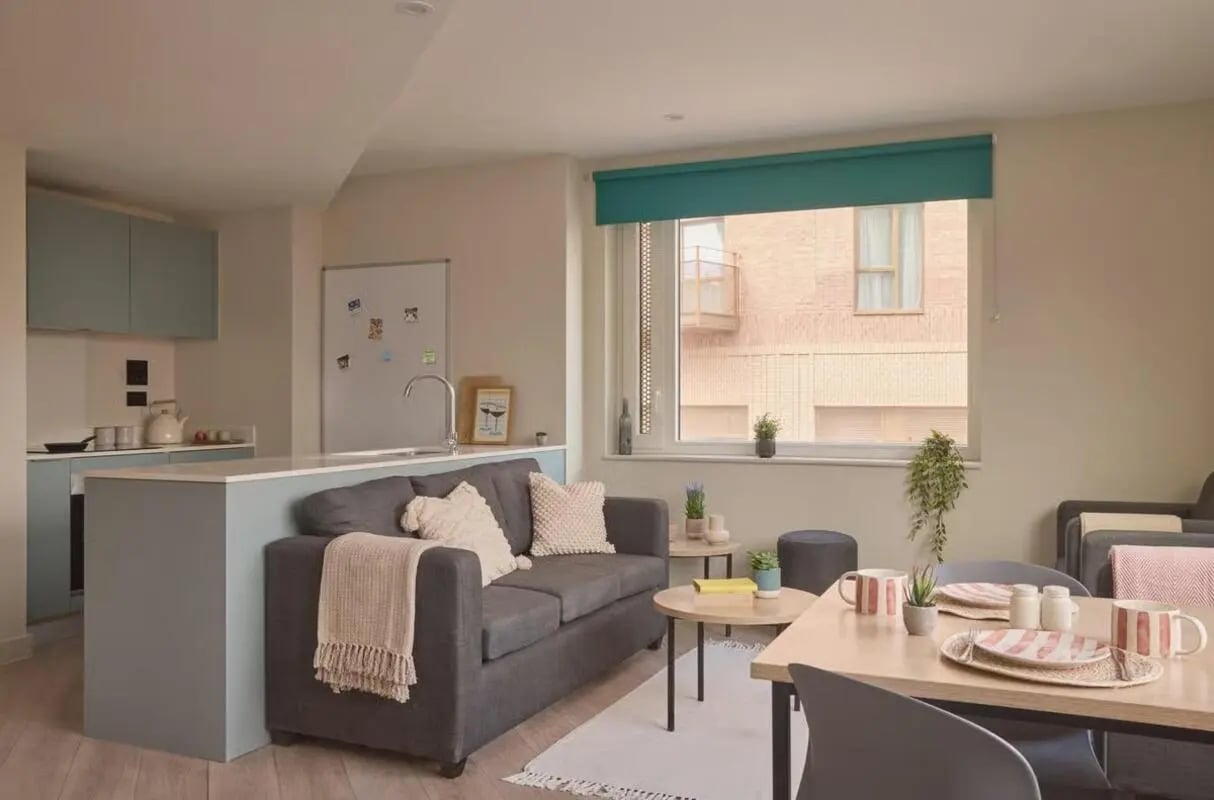 Sofa kitchen and dining area living room at Ark Canning Town in London Student Accommodation