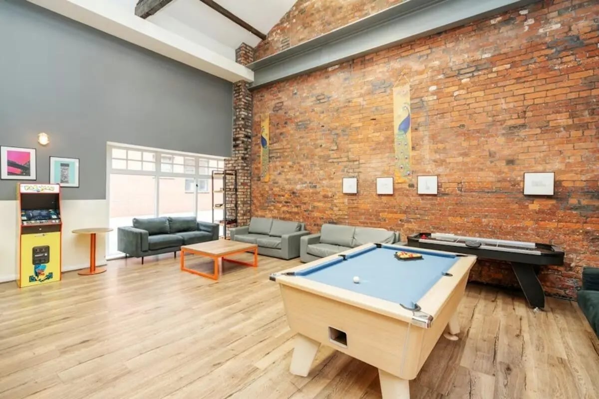 Pool table arcade machine sofas playing area at Sheffield 3 in Sheffield Student Accommodation