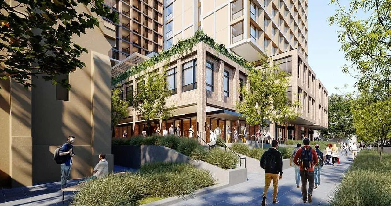 Modern building with people on walkway exterior at Iglu Waterloo in Sydney Student Accommodation