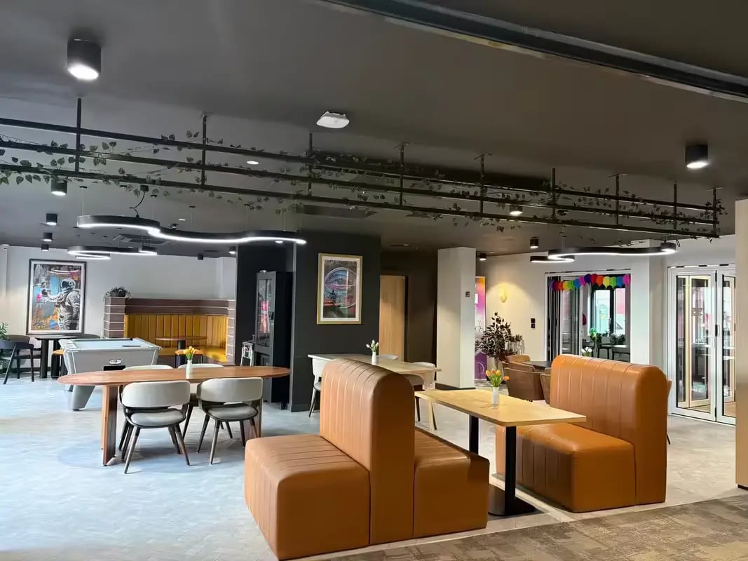 Pool table booth seating and tables living room at The Port On The Square in Bristol Student Accommodation