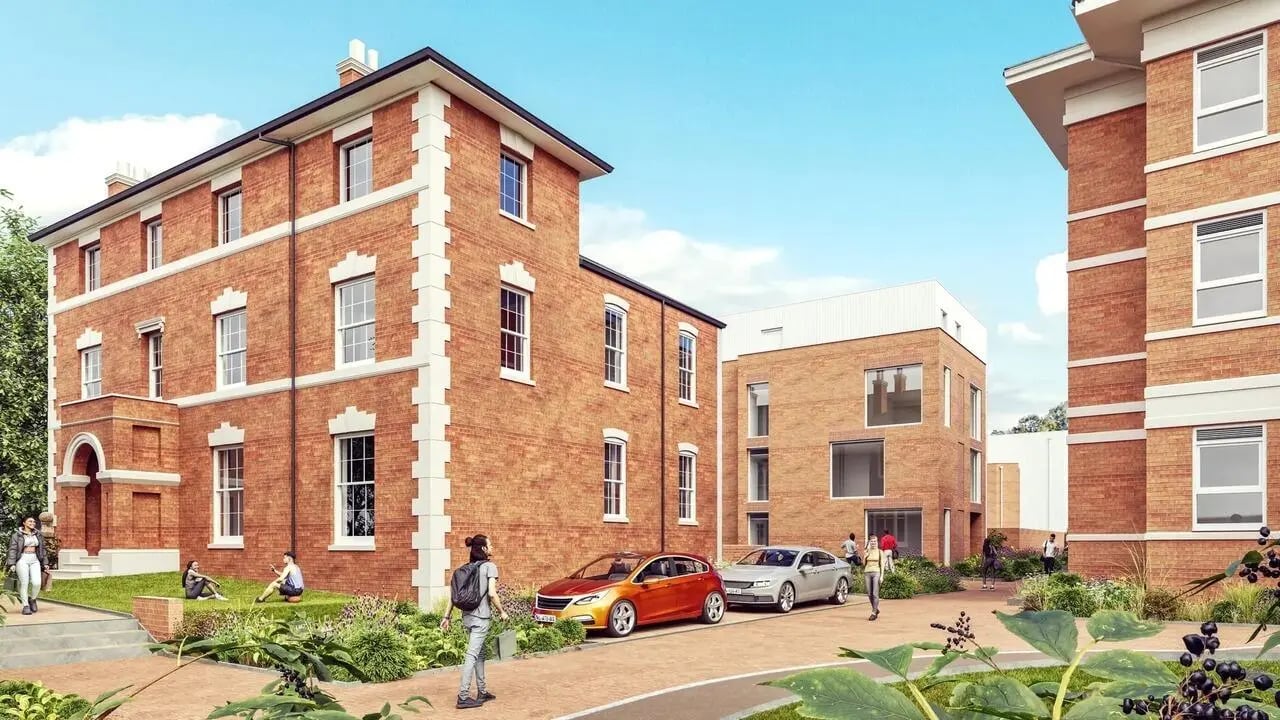 Brick buildings cars and people exterior at St Chads Student Village in Birmingham Student Accommodation